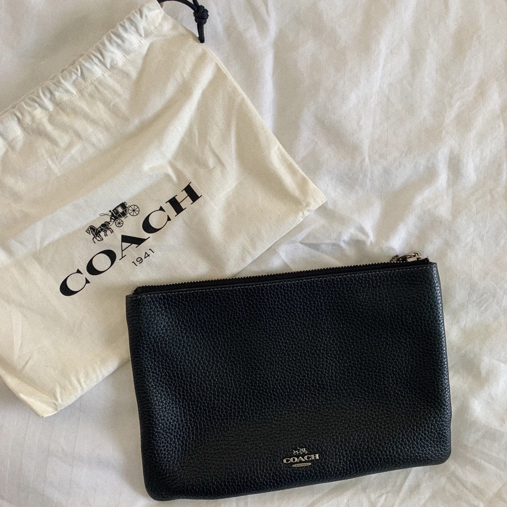 Coach Nomad Black/White Pebble Leather Clutch